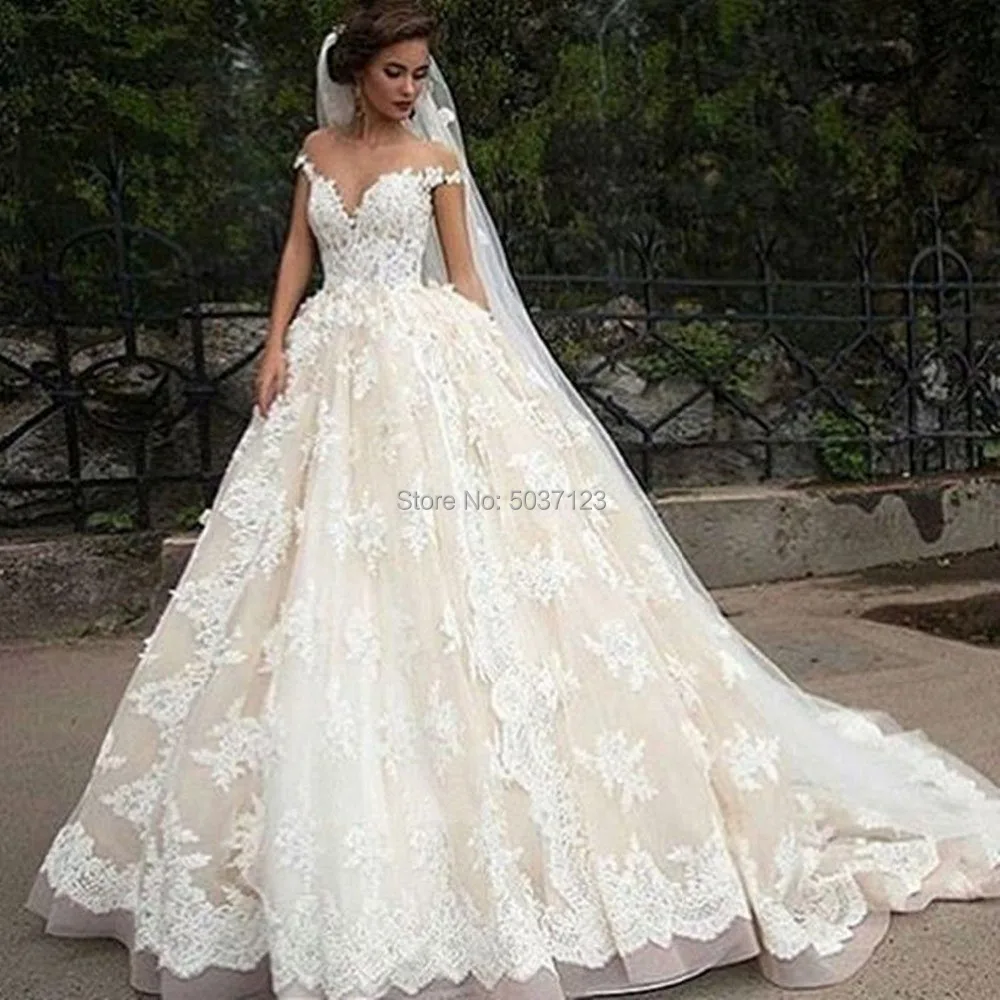 Champagne Wedding Dresses Short Sleeves Zipper 2021 Vintage Ivory Lace Appliques Off the Shoulder Backless Wedding Gowns
Champagne Wedding Dresses Short Sleeves Zipper 2021 Vintage Ivory Lace Appliques Off the Shoulder Backless Wedding Gowns