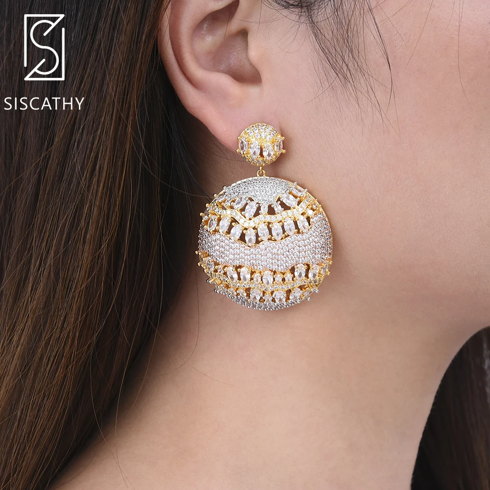 SisCathy 41*56mm Luxury Round Hollow Dubai Nigerian Dangle Drop Earrings AAA Cubic Zirconia Inlaid Wedding Earring Jewelry Party
SisCathy 41*56mm Luxury Round Hollow Dubai Nigerian Dangle Drop Earrings AAA Cubic Zirconia Inlaid Wedding Earring Jewelry Party