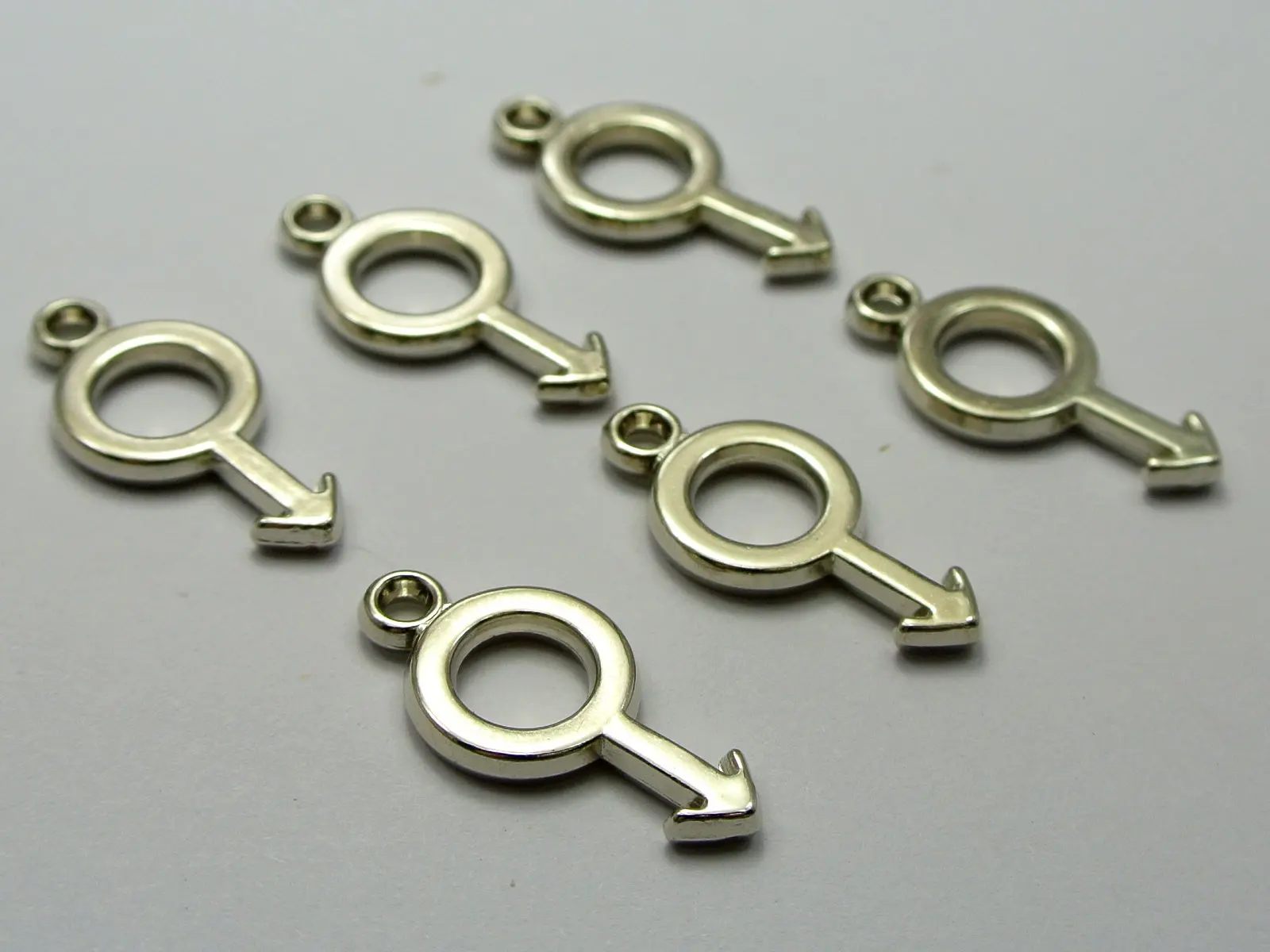 100 серебряных цветных металлических акриловых мужских символов Charm Pendats 25X12mm
100 серебряных цветных металлических акриловых мужских символов Charm Pendats 25X12mm