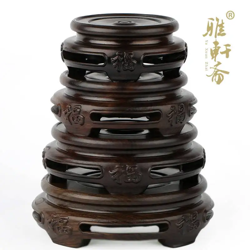 Rosewood crafts wood base vase antique jade teapot cup black rosewood with four foot base
Rosewood crafts wood base vase antique jade teapot cup black rosewood with four foot base