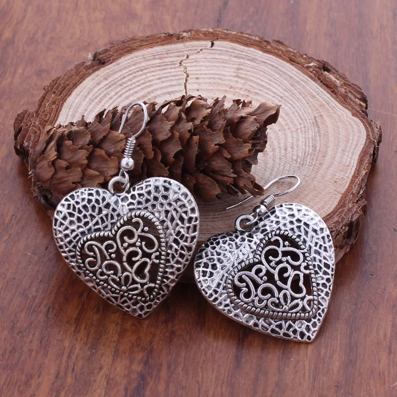Fashion Statement Bohemian Vintage Ethnic Hollow Heart Drop Earring Carved Flowers Drop Earrings For Women
Fashion Statement Bohemian Vintage Ethnic Hollow Heart Drop Earring Carved Flowers Drop Earrings For Women