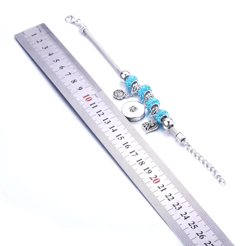 2019 New Faith Cross Snap Jewelry Lobster Buckle Snake Chain Bangles Beaded Snap Bracelet Fit 18MM Snap Button Jewelry
2019 New Faith Cross Snap Jewelry Lobster Buckle Snake Chain Bangles Beaded Snap Bracelet Fit 18MM Snap Button Jewelry
