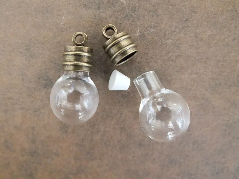 All round glass pendant,rice art glass bottle with antique cap plug charm pendants 23x12mm
All round glass pendant,rice art glass bottle with antique cap plug charm pendants 23x12mm