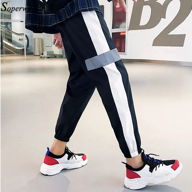 2021 штаны шаровары с разрезом сбоку женские Лоскутные Спортивные отражателем