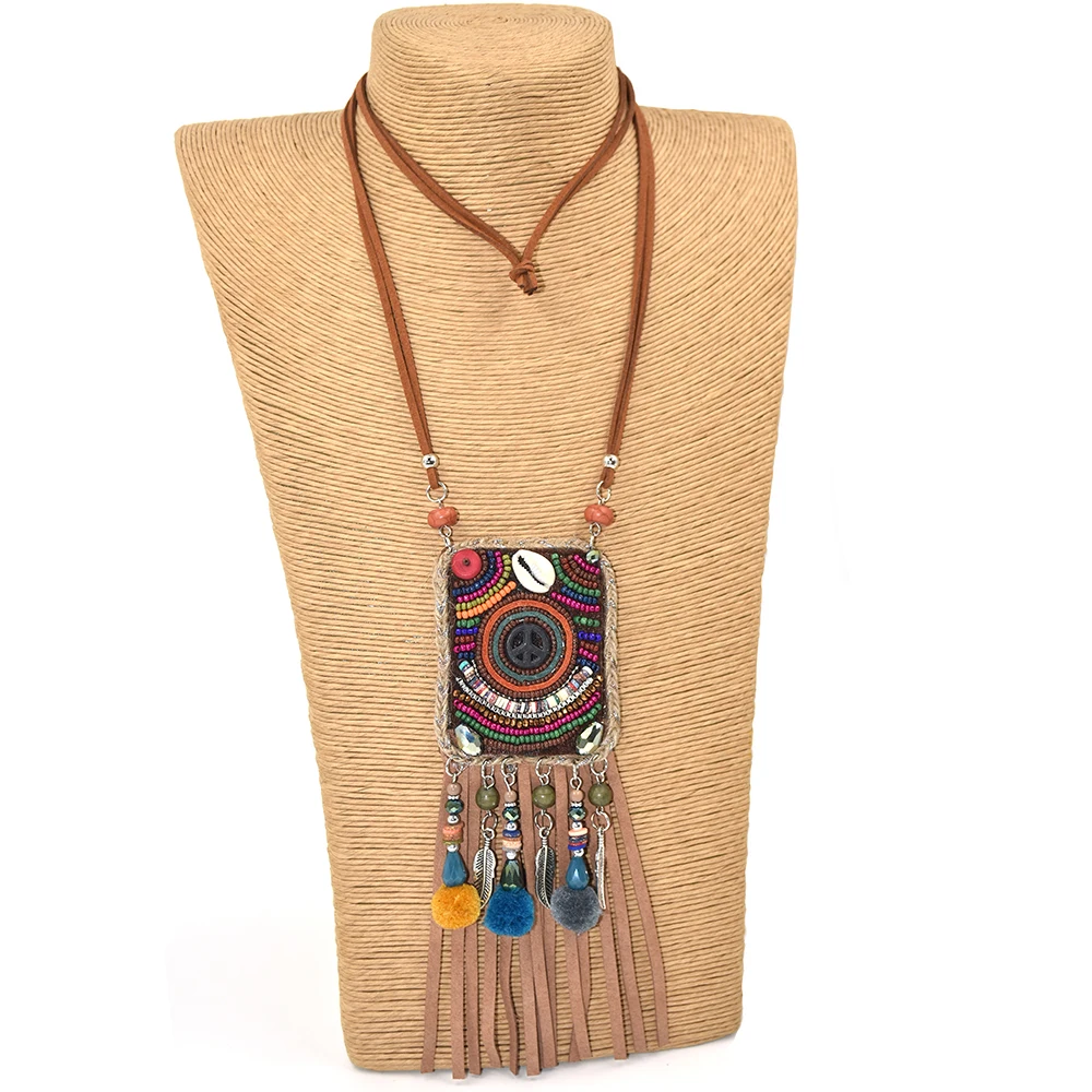 Handmade Ethnic Boho Chic Bohemia Beads Chain Leather Tassel Pendent Necklce Long Fringe Tassel Pompous bag Pendant Necklaces 
Handmade Ethnic Boho Chic Bohemia Beads Chain Leather Tassel Pendent Necklce Long Fringe Tassel Pompous bag Pendant Necklaces