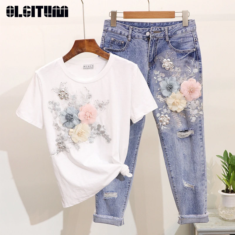 Women Summer Casual Suits 2020 Embroidery 3D Flower O-neck Short Sleeve Tshirts + Hole Ankle-length Pants 2pcs Clothing Sets
Women Summer Casual Suits 2020 Embroidery 3D Flower O-neck Short Sleeve Tshirts + Hole Ankle-length Pants 2pcs Clothing Sets