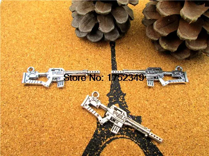 10pcs--Machine Gun Charms,Antique tibetan silver Tone 2 Sided Submachine gun charm pendants 45x14mm
10pcs--Machine Gun Charms,Antique tibetan silver Tone 2 Sided Submachine gun charm pendants 45x14mm