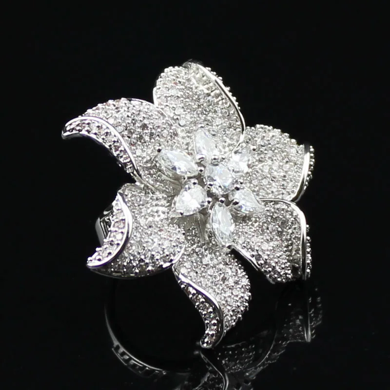 New luxury wedding party ring silver plated in big flower shape women rings prong setting crystal and Cubic Zirconia
New luxury wedding party ring silver plated in big flower shape women rings prong setting crystal and Cubic Zirconia