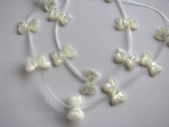Shell Bead 2strands 12x20mm high quality Genuine MOP Shell ,white Pearl Shell butterfly charm beads
Shell Bead 2strands 12x20mm high quality Genuine MOP Shell ,white Pearl Shell butterfly charm beads