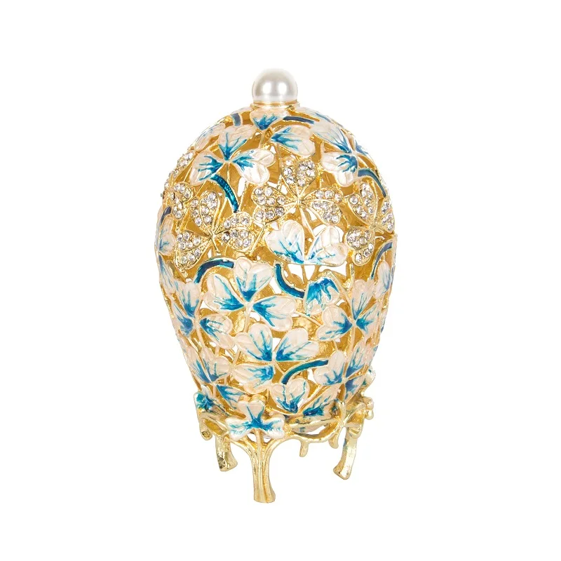 FABERGE EGG brand metal material Hollow out Flower Painting craft and souvenir for home decor
FABERGE EGG brand metal material Hollow out Flower Painting craft and souvenir for home decor