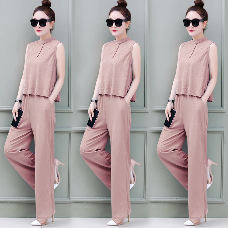 Sleeveless top blouse & wide-legged pants suit short spring Korean fashion two-piece clothing set new women's summer wear
Sleeveless top blouse & wide-legged pants suit short spring Korean fashion two-piece clothing set new women's summer wear
