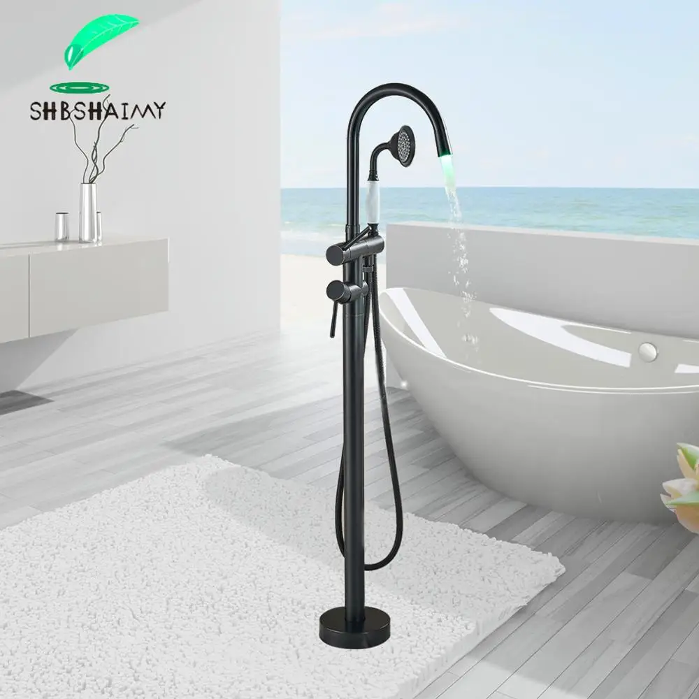 SHBSHAIMY Multi-colored Floor Standing LED Bathtub Faucet Dual Handles Hot Cold Water Mixer Tap 360 Degree Spout Bathroom Faucet
SHBSHAIMY Multi-colored Floor Standing LED Bathtub Faucet Dual Handles Hot Cold Water Mixer Tap 360 Degree Spout Bathroom Faucet