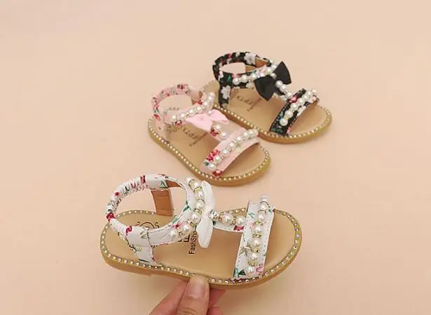 2019 New Kids Baby Teenagers Grils School Sandals Bare Toes Shoes Summer Princess Pearl Flat Beach Shoes
2019 New Kids Baby Teenagers Grils School Sandals Bare Toes Shoes Summer Princess Pearl Flat Beach Shoes