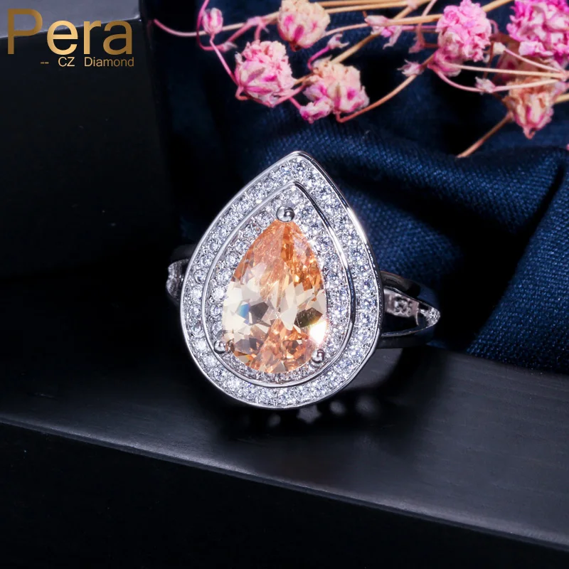 Фото Женское кольцо с фианитом в форме груши микрозакрепкой| - купить