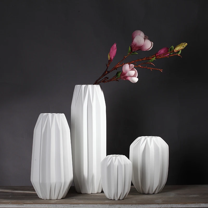2019 NEW design white ceramic creative contracted flower vase pot home decor craft room decoration handicraft porcelain figurine
2019 NEW design white ceramic creative contracted flower vase pot home decor craft room decoration handicraft porcelain figurine
