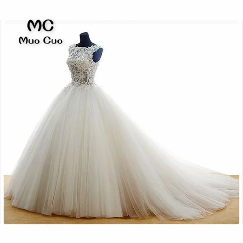 2018 Real Ball Gown Wedding Dresses Sleeveless Robe de mariage Lace Up Back Tulle vestido de noiva Appliques Lace Bridal Gowns
2018 Real Ball Gown Wedding Dresses Sleeveless Robe de mariage Lace Up Back Tulle vestido de noiva Appliques Lace Bridal Gowns