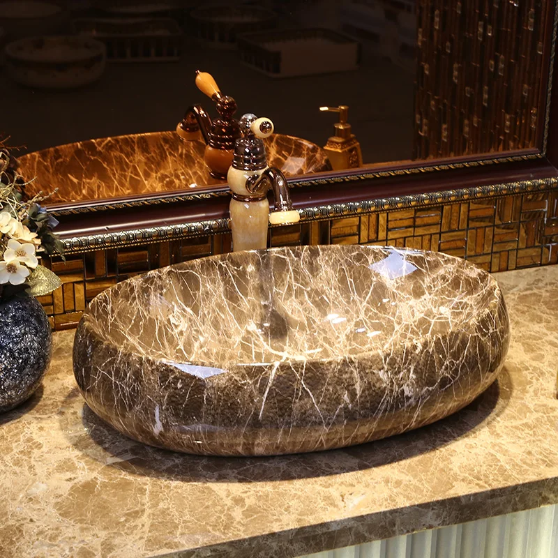 King Yanfang marble countertop RETRO art ceramic basin mesa basin oval table wash basin
King Yanfang marble countertop RETRO art ceramic basin mesa basin oval table wash basin
