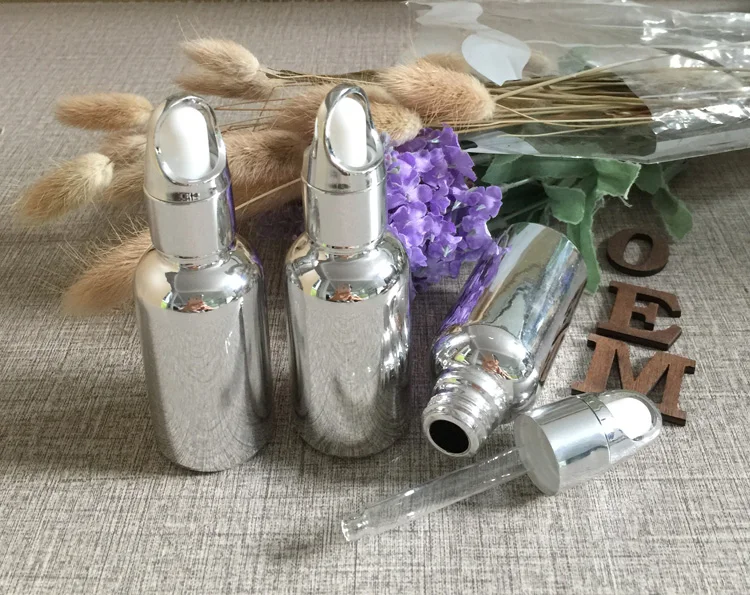 30ml glass dropper bottles w silver plated 1 ounce makeup containers1 oz empty refillable cosmetics perfume sample bottles HOT
30ml glass dropper bottles w silver plated 1 ounce makeup containers1 oz empty refillable cosmetics perfume sample bottles HOT