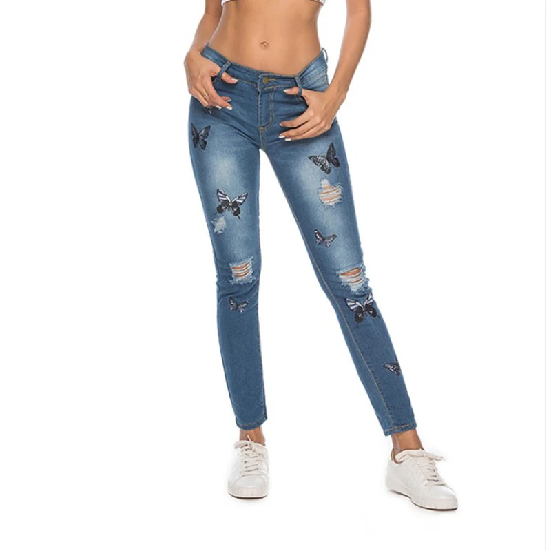 Фото Женские рваные джинсы с высокой талией обтягивающие узкие эластичные Стрейчевые