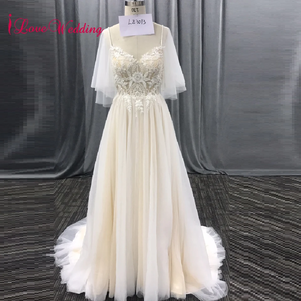 iLoveWedding Hot New V-neck Puff Sleeve Lace Applique A Line Tulle Cheap Beach Bridal Wedding Dresses
iLoveWedding Hot New V-neck Puff Sleeve Lace Applique A Line Tulle Cheap Beach Bridal Wedding Dresses