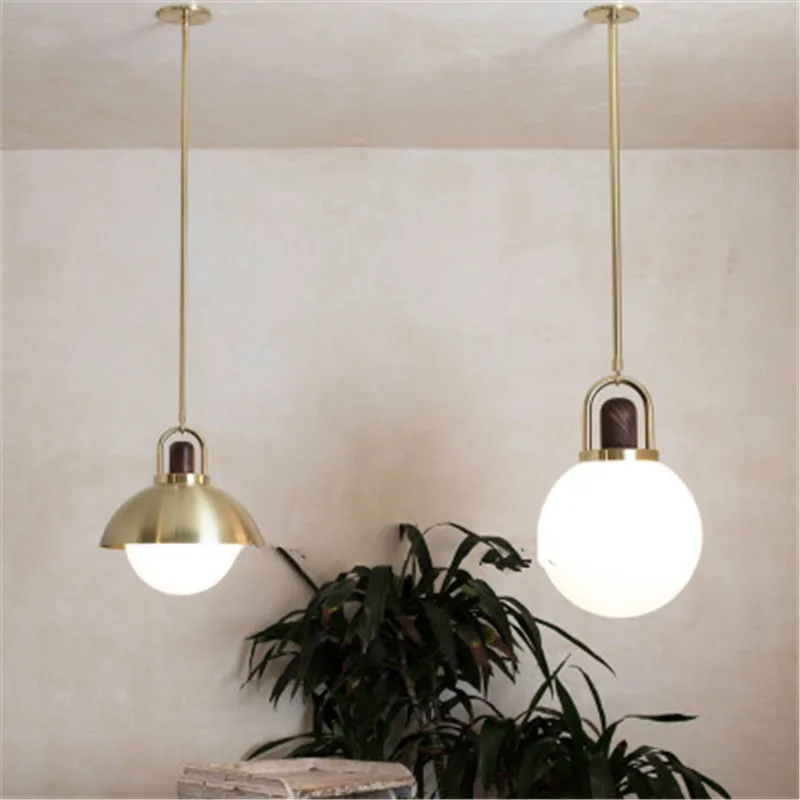 Post-modern Creative Wooden Living Room Pendant Lamp Simple Bedroom Bedside Restaurant Fitting Room Personality Glass Ball Lamp
Post-modern Creative Wooden Living Room Pendant Lamp Simple Bedroom Bedside Restaurant Fitting Room Personality Glass Ball Lamp