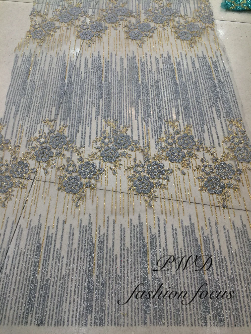 Nigerian Tulle Lace Fabric newest design Beaded African French glitter Lace Fabrics in grey color
Nigerian Tulle Lace Fabric newest design Beaded African French glitter Lace Fabrics in grey color