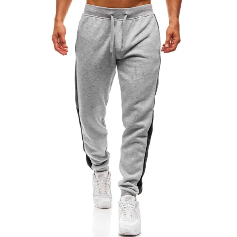 2018 Foreign trade hot casual sports pants trousers stitching design large size sports trousers men jogger
2018 Foreign trade hot casual sports pants trousers stitching design large size sports trousers men jogger