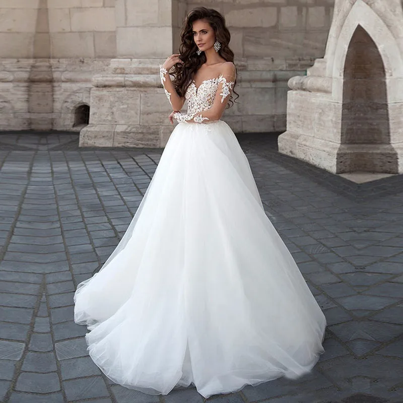 U-SWEAR 2020 Sexy Backless Lace A-Line Wedding Dresses Illusion Long Sleeves O-Neck Appliques Cheap vestido fiesta
U-SWEAR 2020 Sexy Backless Lace A-Line Wedding Dresses Illusion Long Sleeves O-Neck Appliques Cheap vestido fiesta