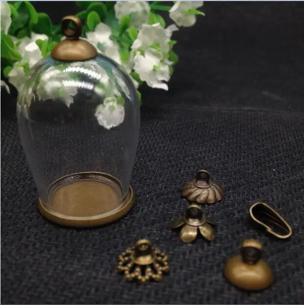 50sets 30x18mm Cloche oval-shaped arch wishing bottle jar bronze color flat bottomed tray Christmas vial pendant glass globes
50sets 30x18mm Cloche oval-shaped arch wishing bottle jar bronze color flat bottomed tray Christmas vial pendant glass globes