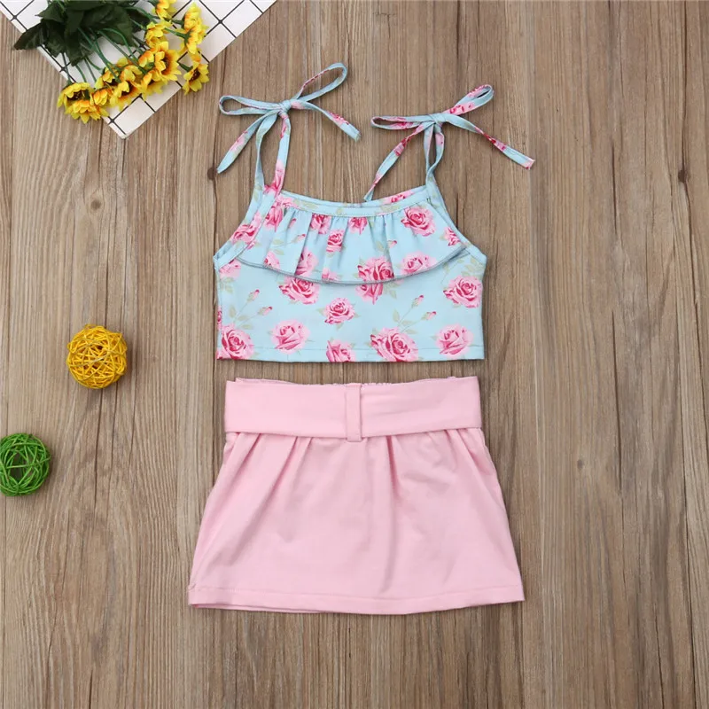New Toddler Baby Girls Clothes Sleeveless Strap Ruffle Floral Tank Vest Crop Tops Bow Button Skirt Girls Dress 2Pcs Outfits Sets
New Toddler Baby Girls Clothes Sleeveless Strap Ruffle Floral Tank Vest Crop Tops Bow Button Skirt Girls Dress 2Pcs Outfits Sets