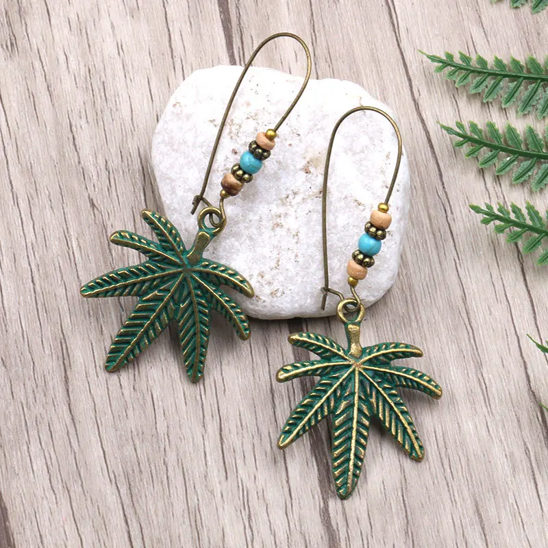 Women New Bohemian Ethnic Indian Earring Female Retro Maple Leaf Feather Earrings Vintage Classic Metal Tibet Jewelry Gifts
Women New Bohemian Ethnic Indian Earring Female Retro Maple Leaf Feather Earrings Vintage Classic Metal Tibet Jewelry Gifts