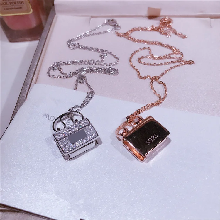Personalized accessories fashion inlaid zircon simple letter handbag necklace wild female necklace
Personalized accessories fashion inlaid zircon simple letter handbag necklace wild female necklace