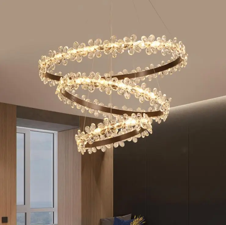 Simple modern Chandelier Creative Crystal flower Rings Circle LED iron Chandelier Lighting For bedroom living room.
Simple modern Chandelier Creative Crystal flower Rings Circle LED iron Chandelier Lighting For bedroom living room.