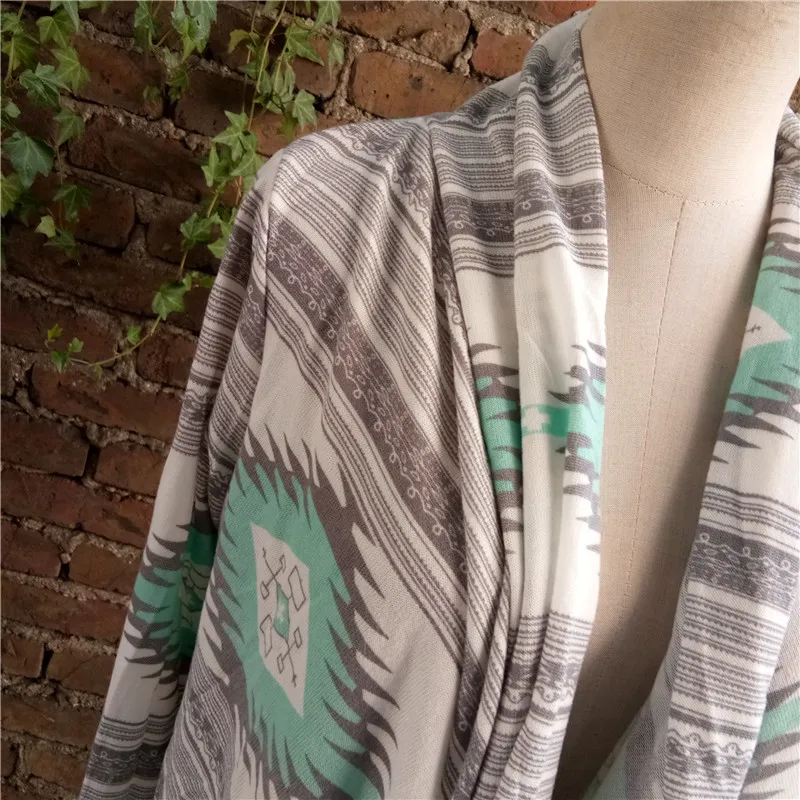 Fashion winter Kimono Knitted Cardigan Long Sleeve Poncho Sweaters Print irregular sexy lady warm Jackets Cardigan Women Tops 
Fashion winter Kimono Knitted Cardigan Long Sleeve Poncho Sweaters Print irregular sexy lady warm Jackets Cardigan Women Tops