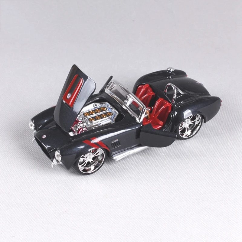 1965 Shelby Cobra 427 1:24 Maisto сплав модель автомобиля Металл литье под давлением Ford Mustang классические автомобили Roadster коллекция Подарочная игрушка
1965 Shelby Cobra 427 1:24 Maisto сплав модель автомобиля Металл литье под давлением Ford Mustang классические автомобили Roadster коллекция Подарочная игрушка