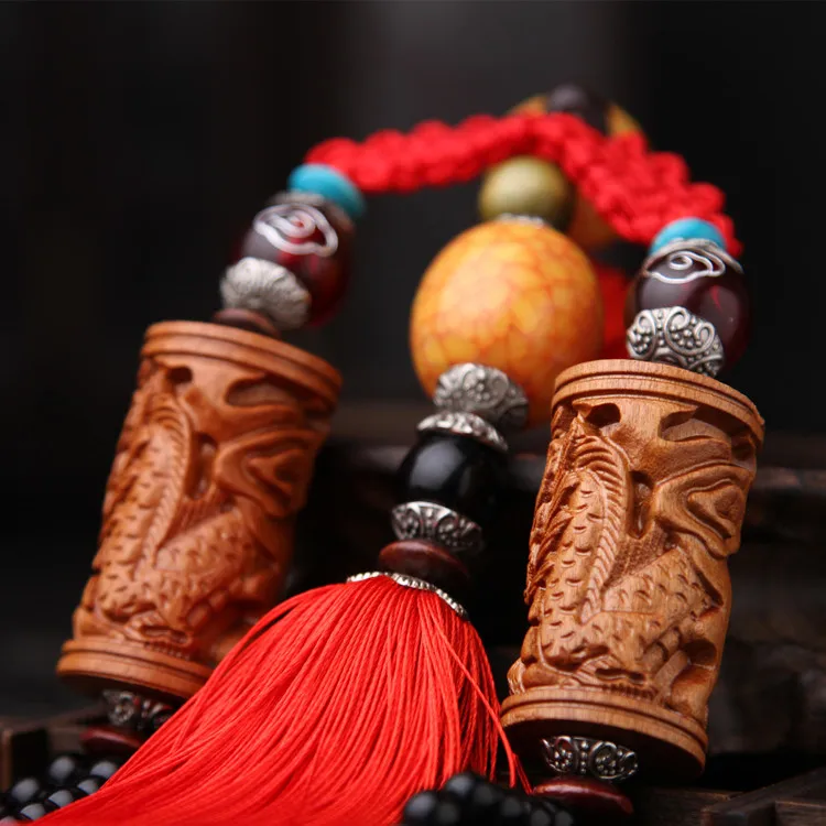 Boutique hot car pendant safe Longzhu high-grade peach wood key chain car pendulum ornaments carved car hanging car
Boutique hot car pendant safe Longzhu high-grade peach wood key chain car pendulum ornaments carved car hanging car
