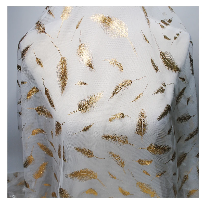 Bronzed feather mesh fabric DIY handmade wedding dress designer special lace fabric does not fade transparent soft mesh fabric
Bronzed feather mesh fabric DIY handmade wedding dress designer special lace fabric does not fade transparent soft mesh fabric