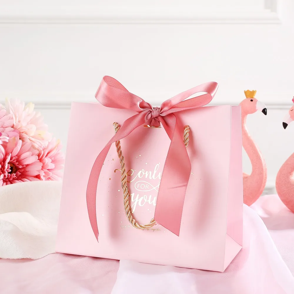 10pcs New Originality Pink High-Quality Paper Candy Box Tote Bag Packaging Wedding Favors Birthday Party Supplie
10pcs New Originality Pink High-Quality Paper Candy Box Tote Bag Packaging Wedding Favors Birthday Party Supplie