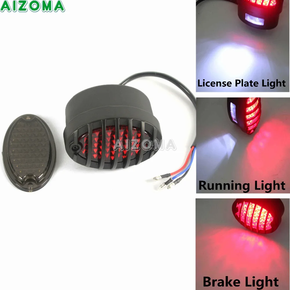 Motorcycle Custom Universal Oval Grille LED Brake Taillights w/ License Plate Light For Harley Cafe Racer Chopper Bobber
Motorcycle Custom Universal Oval Grille LED Brake Taillights w/ License Plate Light For Harley Cafe Racer Chopper Bobber