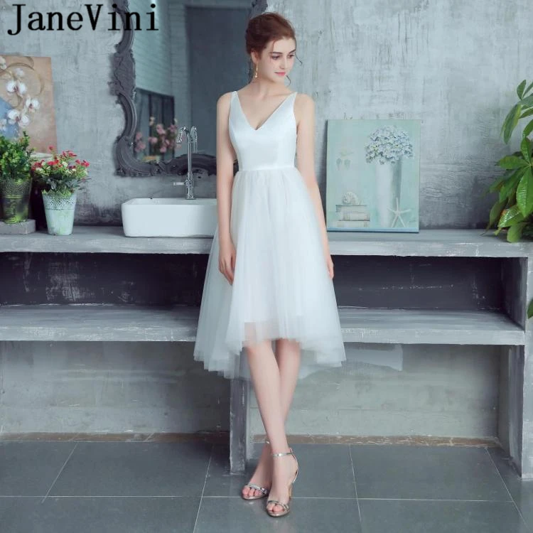 JaneVini Elegant White Tulle A Line Bridesmaid Dresses Sexy Deep V Neck Spaghetti Straps Backless Tea Length Wedding Guest Gowns
JaneVini Elegant White Tulle A Line Bridesmaid Dresses Sexy Deep V Neck Spaghetti Straps Backless Tea Length Wedding Guest Gowns
