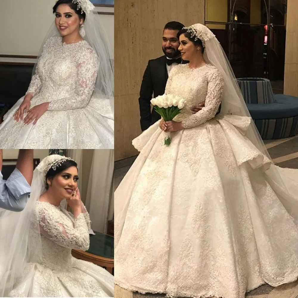 Роскошное бальное платье, свадебные платья 2019, кружевное платье с длинными рукавами и аппликацией из бисера, свадебное платье со шлейфом
Роскошное бальное платье, свадебные платья 2019, кружевное платье с длинными рукавами и аппликацией из бисера, свадебное платье со шлейфом