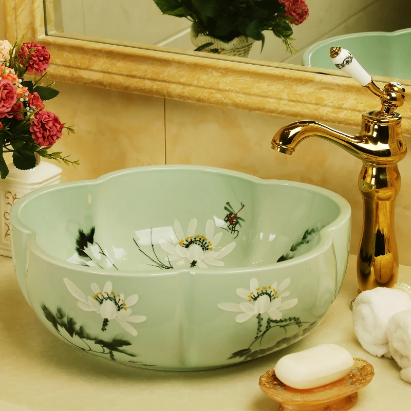 Jingdezhen handmade rose flower shape ceramic porcelain counter top wash basin sink
Jingdezhen handmade rose flower shape ceramic porcelain counter top wash basin sink