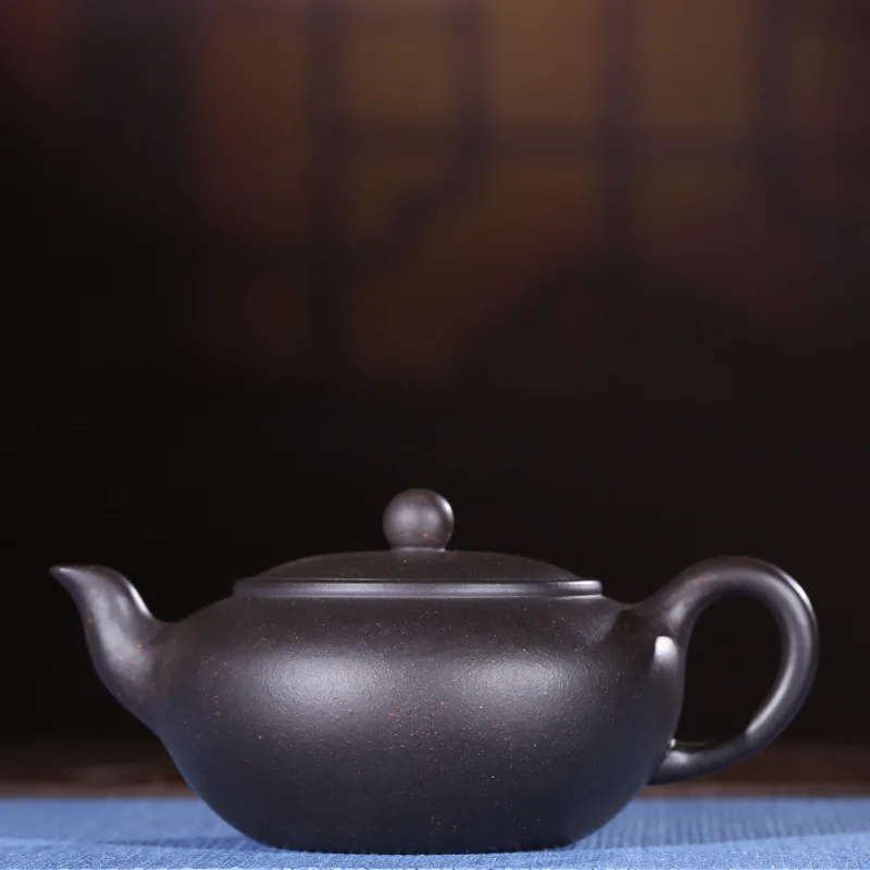 Yixing recommended authentic handmade undressed ore just flat black mud black gold zhu okho kung fu tea tea set gift
Yixing recommended authentic handmade undressed ore just flat black mud black gold zhu okho kung fu tea tea set gift