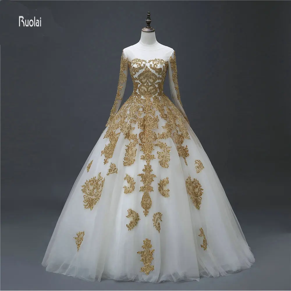 2017 Real Sample New Gold Lace Applique Beading Long Sleeves Tulle Scoop Zipper Back Wedding Dresses For Party
2017 Real Sample New Gold Lace Applique Beading Long Sleeves Tulle Scoop Zipper Back Wedding Dresses For Party