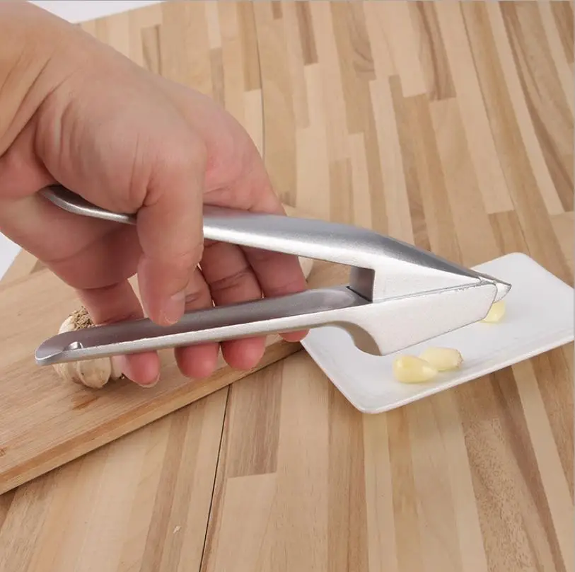 Solid aluminum garlic press manual garlic garlic grinder garlic cleaner removable cleaning kitchen gadget
Solid aluminum garlic press manual garlic garlic grinder garlic cleaner removable cleaning kitchen gadget