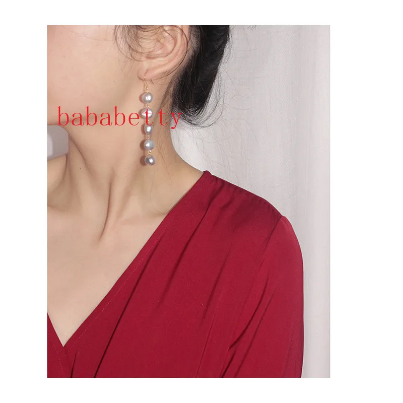 Simple and elegant baroque white irregular natural freshwater pearl 8-9MM Tibetan silver earrings LONG 7CM
Simple and elegant baroque white irregular natural freshwater pearl 8-9MM Tibetan silver earrings LONG 7CM