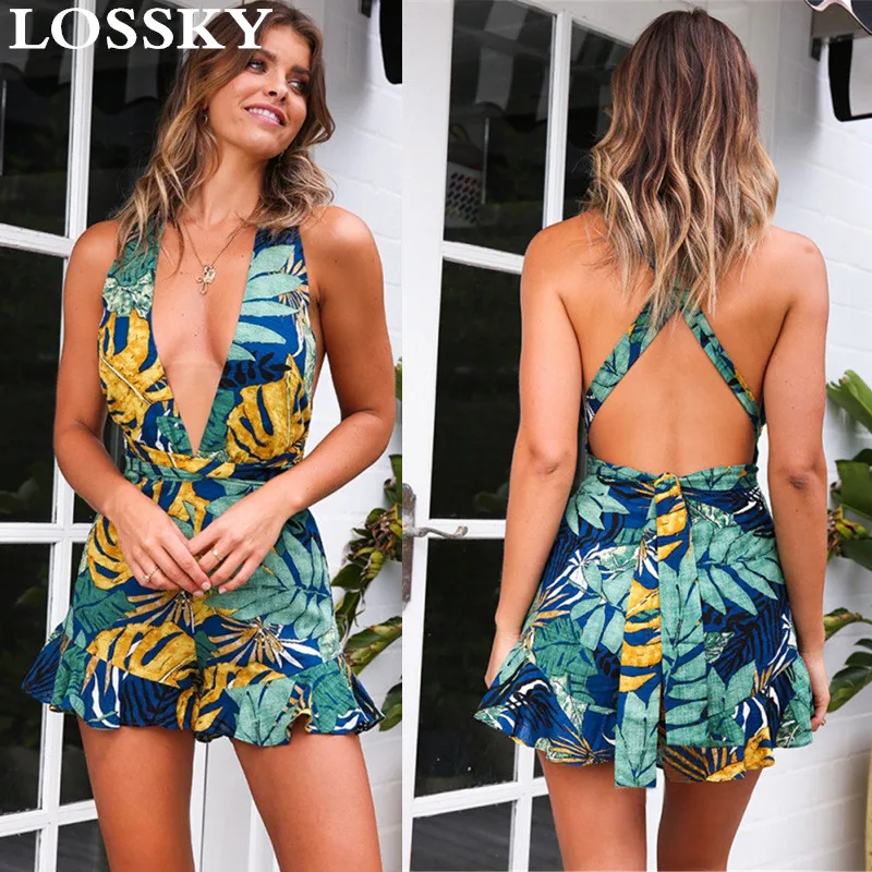 Leaves Print Sexy Backless Playsuit Casual Deep V Neck Sleeveless Ruffles Back Bow Tie Women Summer Beach Jumpsuit Boho Rompers
Leaves Print Sexy Backless Playsuit Casual Deep V Neck Sleeveless Ruffles Back Bow Tie Women Summer Beach Jumpsuit Boho Rompers