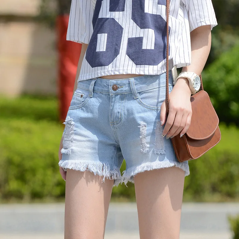 2019 New Summer jeans woman high waist denim shorts female loose raw edge hole women's jeans femme mujer hot pants tide
2019 New Summer jeans woman high waist denim shorts female loose raw edge hole women's jeans femme mujer hot pants tide