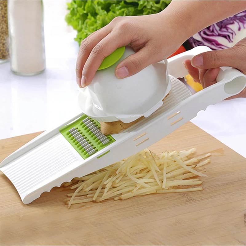Vegetable Cutter with Steel Blade Mandoline Slicer Potato Peeler Carrot Cheese Grater vegetable slicer Kitchen Accessorie
Vegetable Cutter with Steel Blade Mandoline Slicer Potato Peeler Carrot Cheese Grater vegetable slicer Kitchen Accessorie