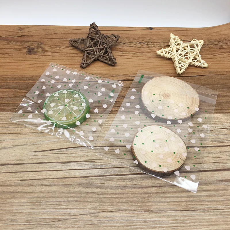 100pcs/lot Food Packaging Bags Cookie Mini Heart Print Self-adhesive Plastic Candy Cake Cookies Bags Christmas gifts Bags
100pcs/lot Food Packaging Bags Cookie Mini Heart Print Self-adhesive Plastic Candy Cake Cookies Bags Christmas gifts Bags